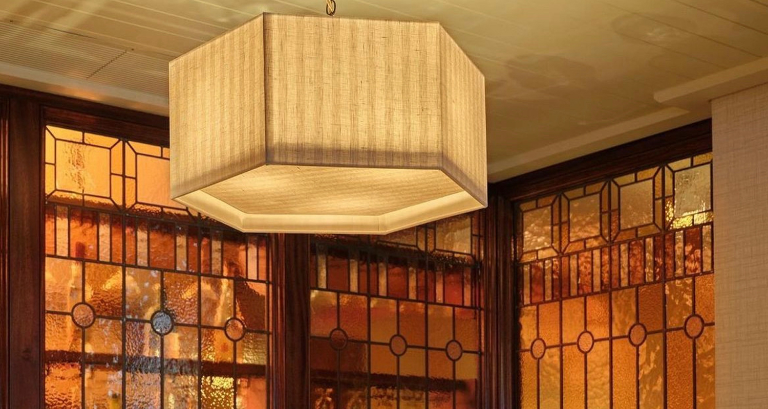 Hexagonal silk striped pendant lampshade at a restaurant in 20 Berkeley Square