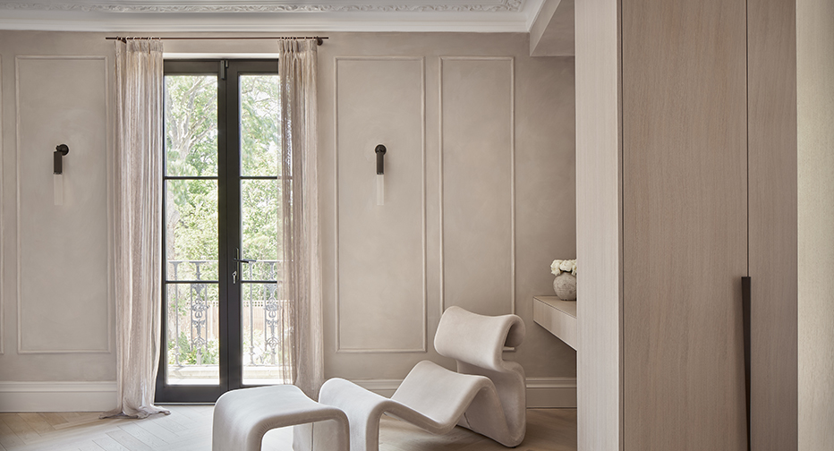 Minimalist luxury interior with bespoke VRNRSTRE sheer curtains, featuring floor-to-ceiling French doors and soft neutral finishes. Showcases custom window treatments designed for elegance and light control in high-end residential spaces.