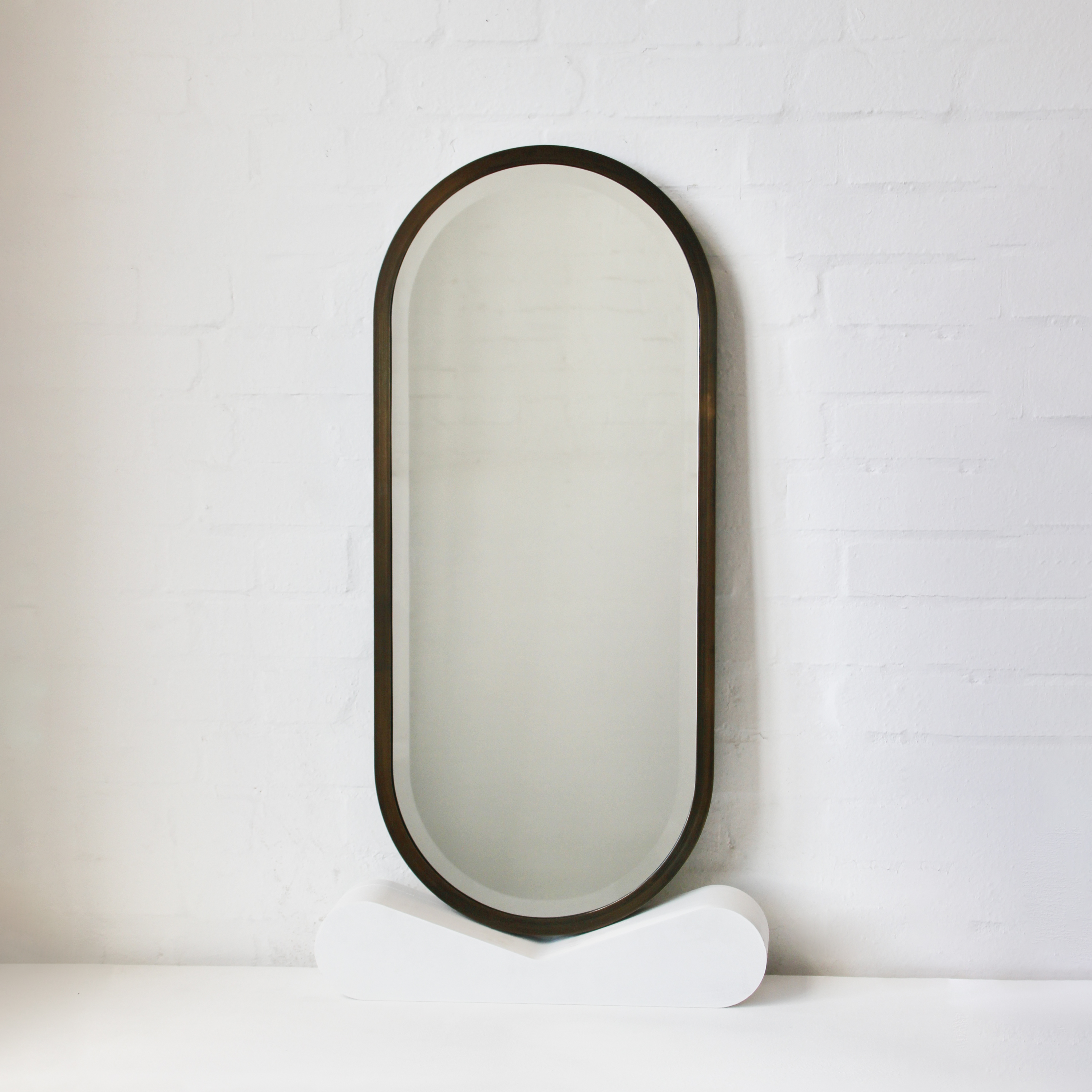 Handcrafted Capsula™ Bevelled Mirror with a Bronze Patina Brass Frame