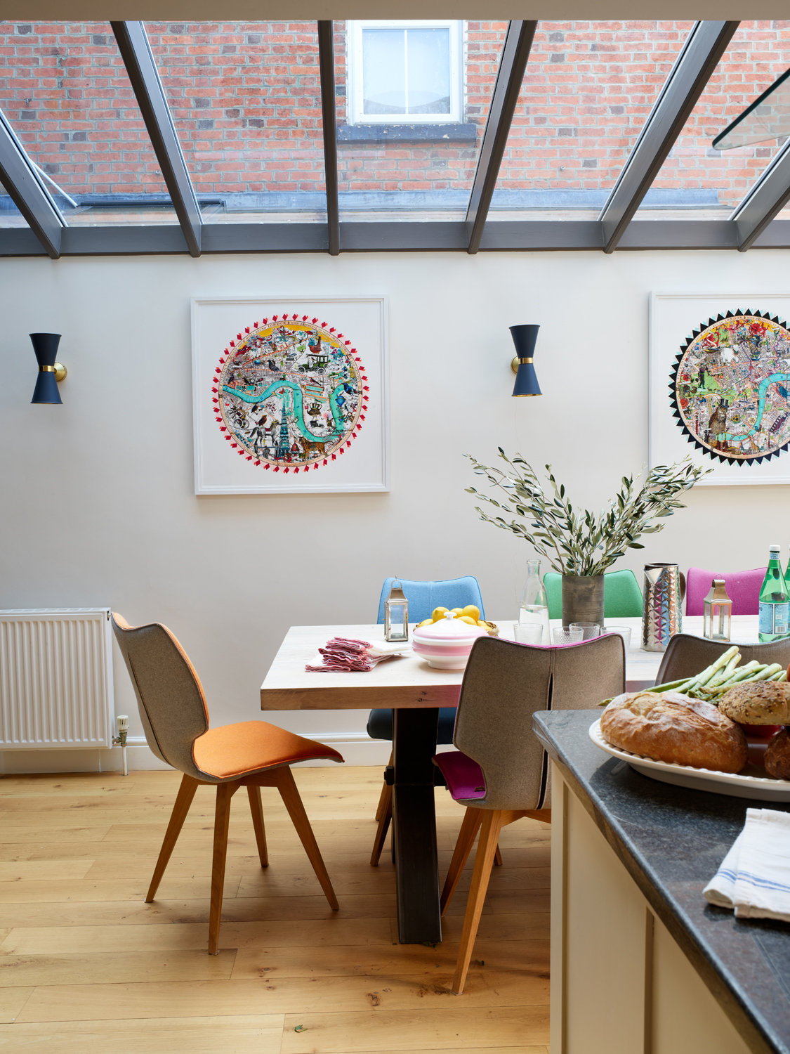 Colourful dining chairs in kitchen 