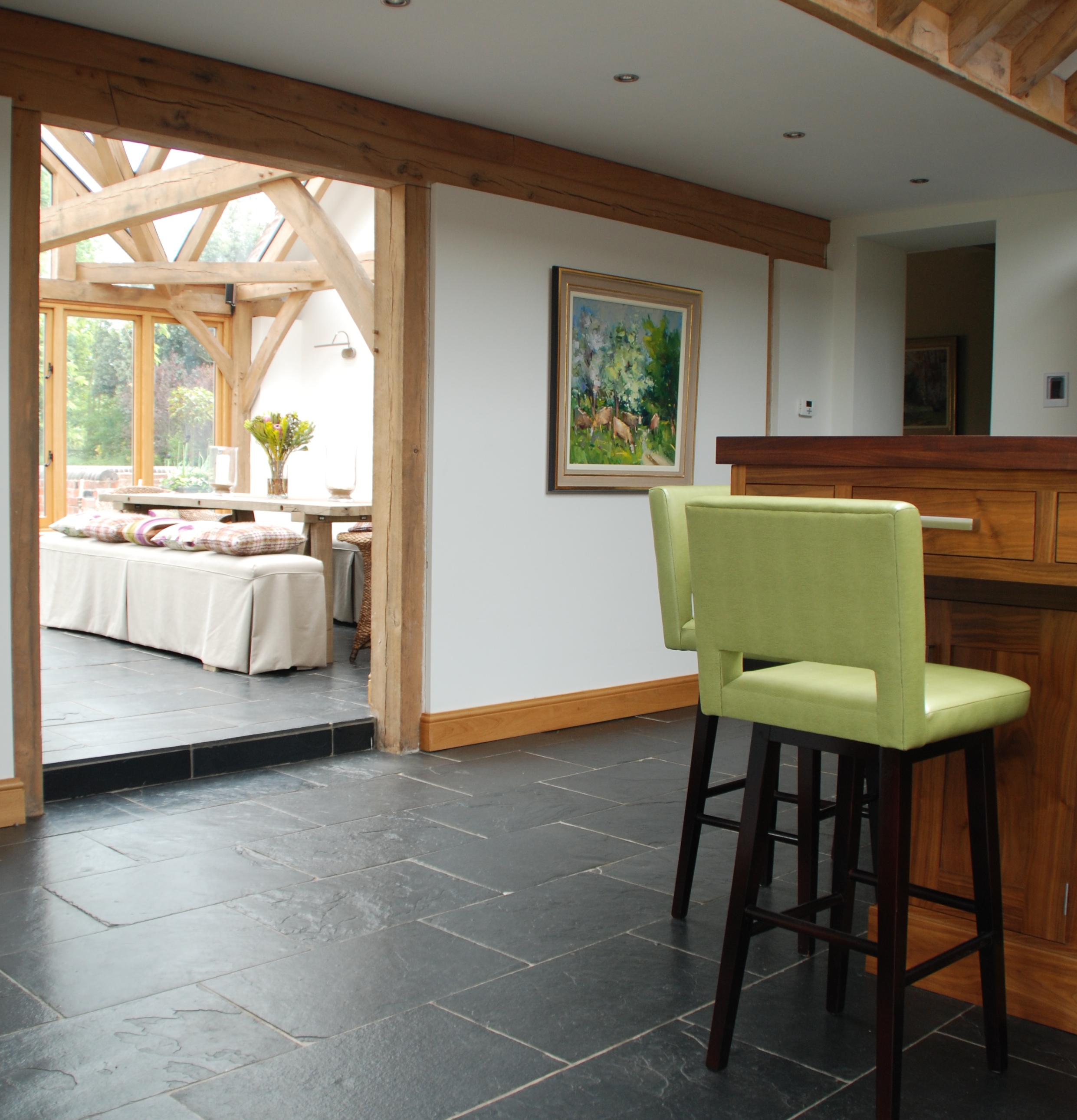 Wood Kitchen with lime green bar stools
