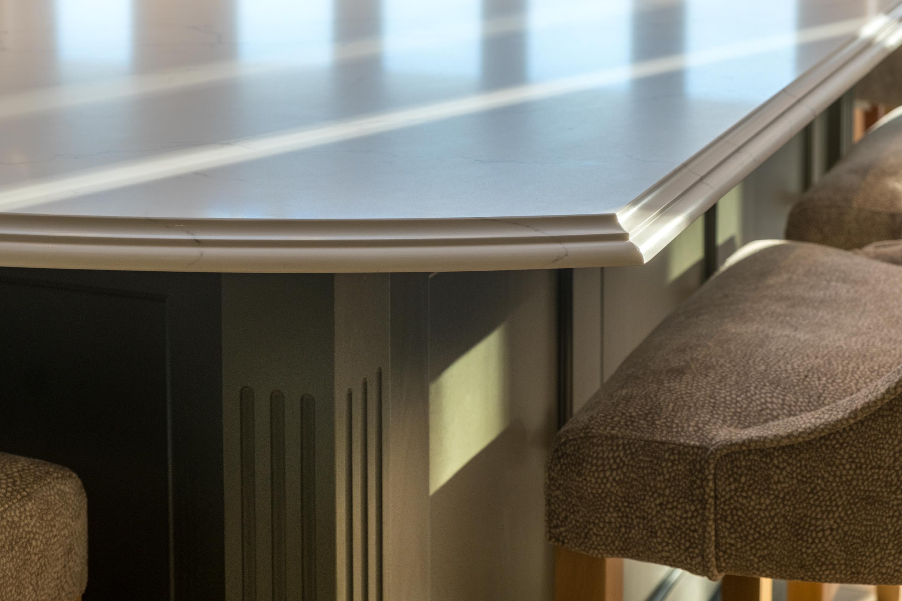 Fluted solid oak posts with detailed Quartz worktop painted in willow.