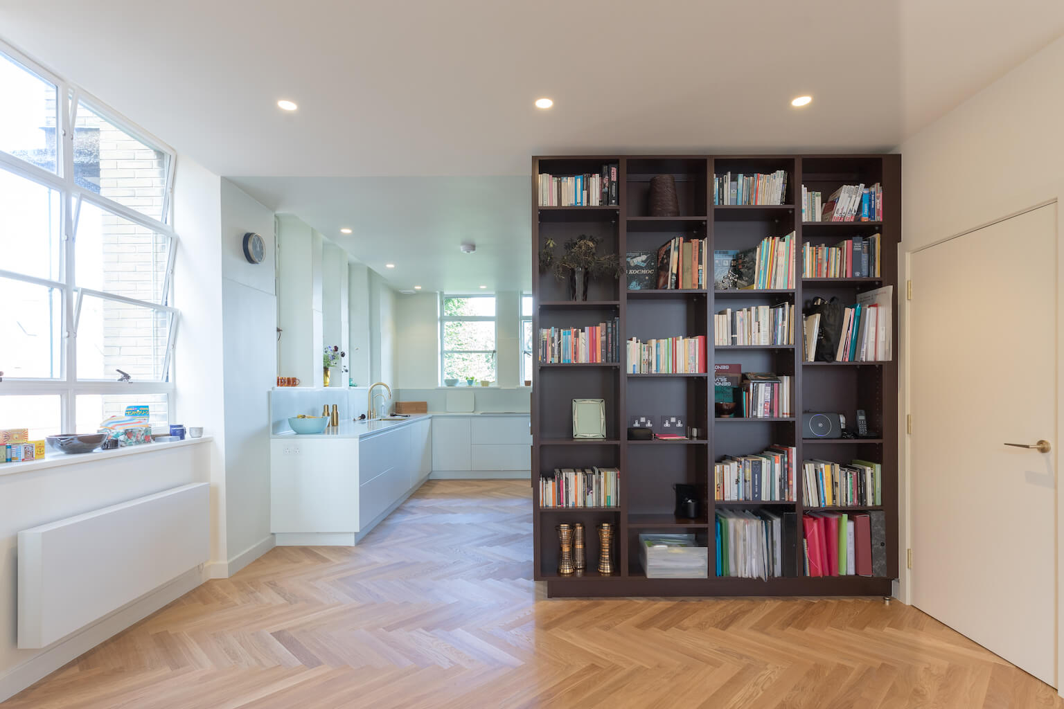 dark joinery and white minimalist kitchen 