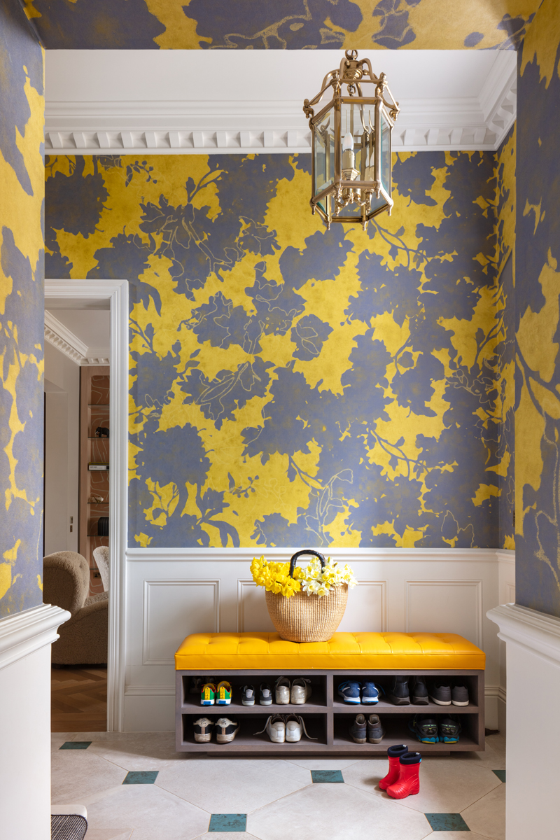 Entrance hall; yellow floral wallpaper; yellow bench with shoe storage; Edwardian house