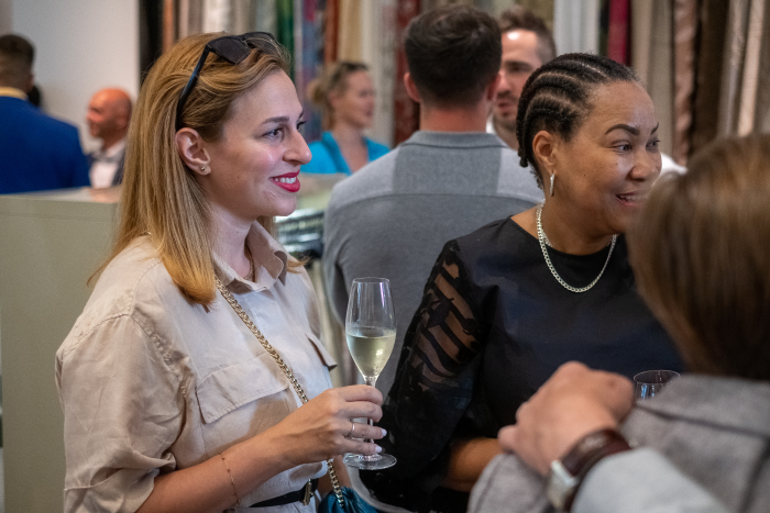 People chatting at an event