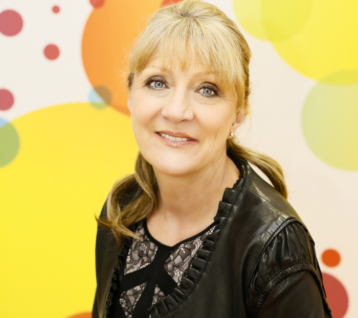 smiling blonde haired woman