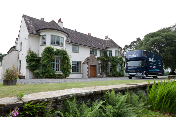 removals van outside a house.