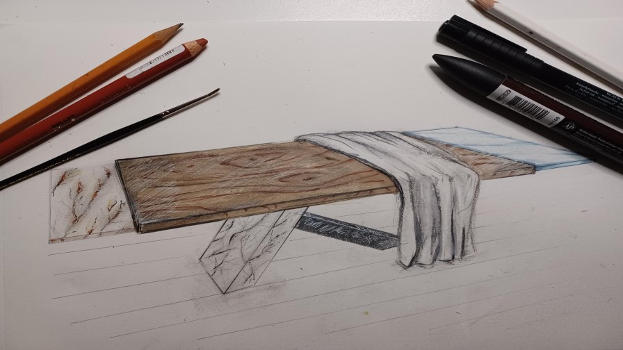 pens and pencils on a drawing.