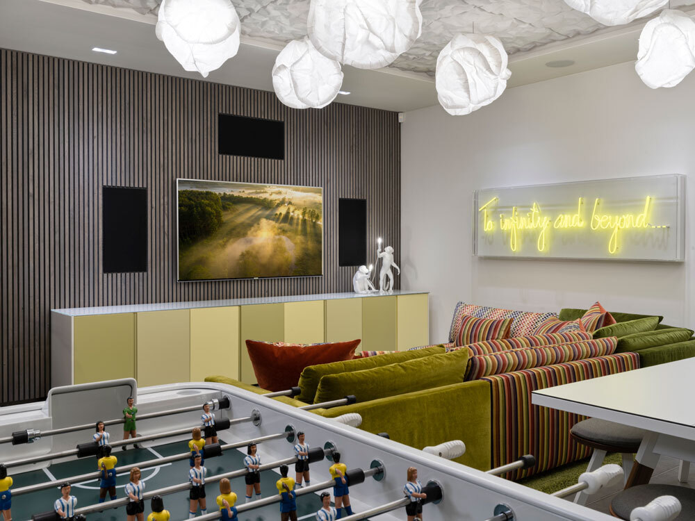 Games room with TV and sofa