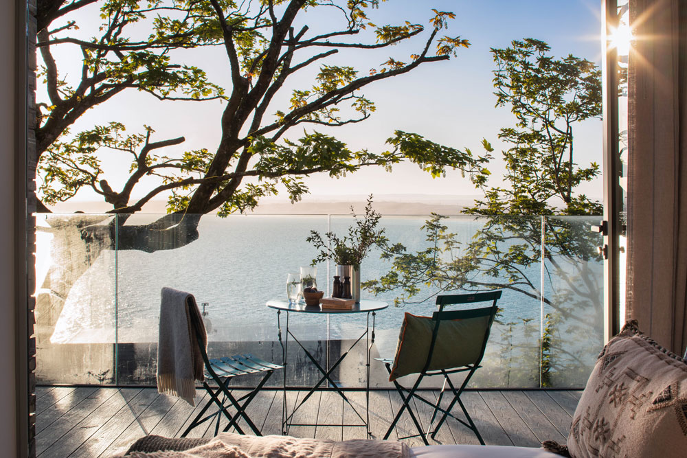Balcony table and chairs in the sunshine