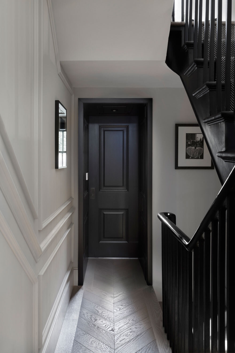 Hallway leading to closed door