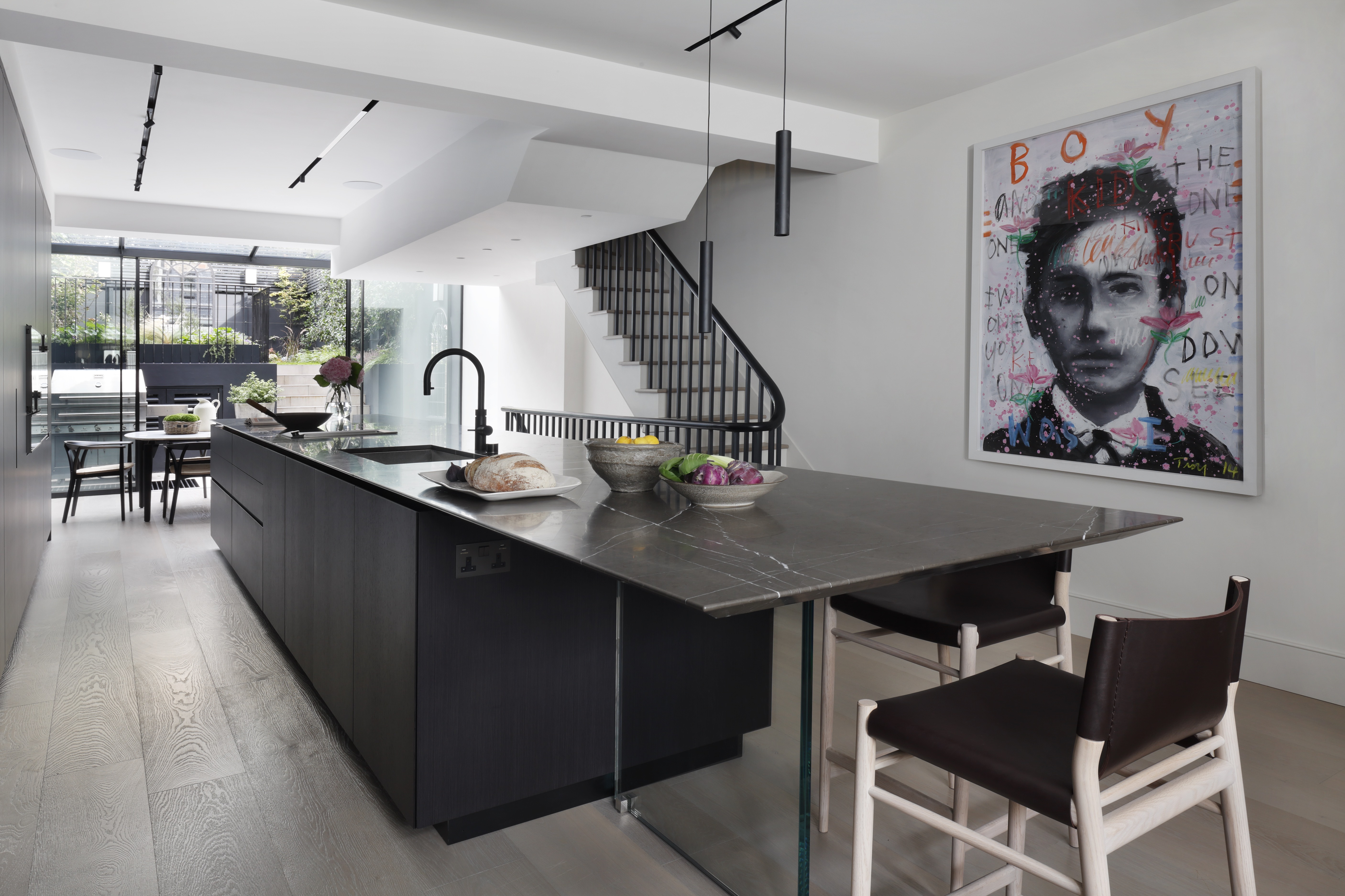 Kitchen with island and artwork
