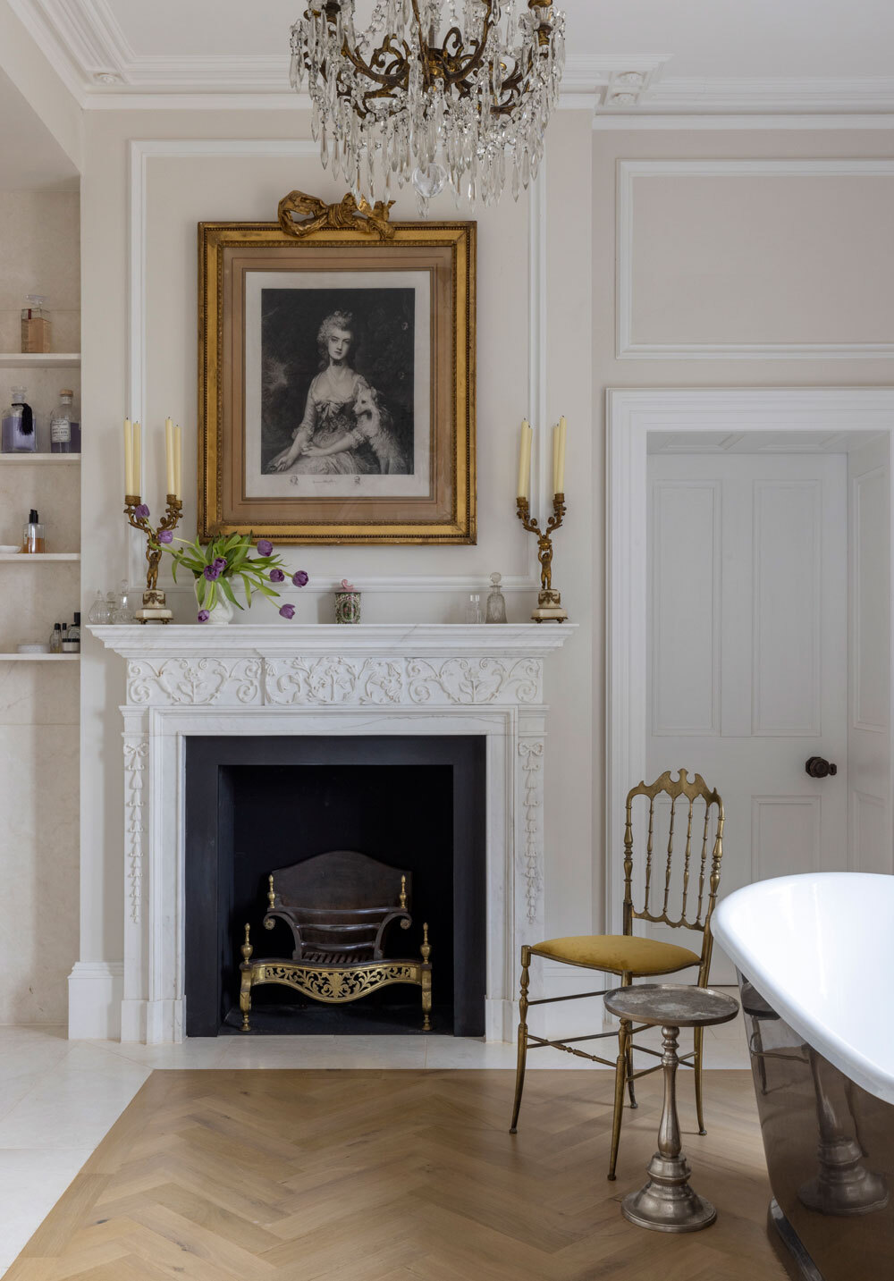 Fireplace in wall with art above mantle 