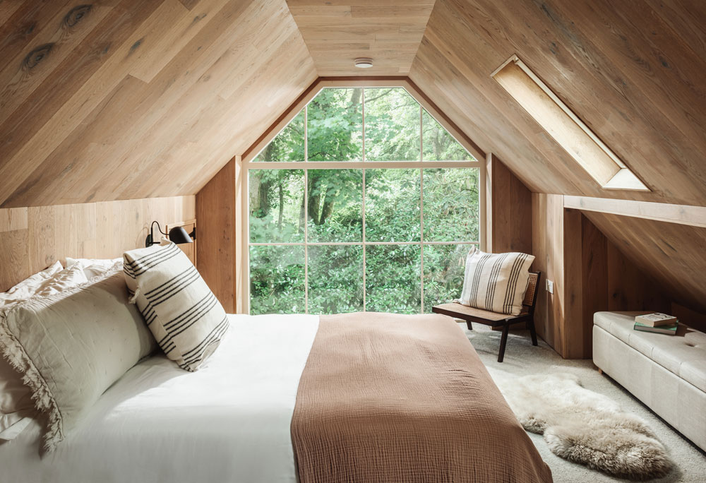 Bedroom in the eaves with large picture window