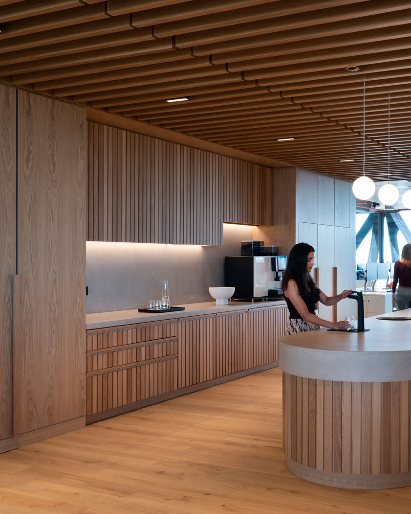 Kitchen space with women using sink