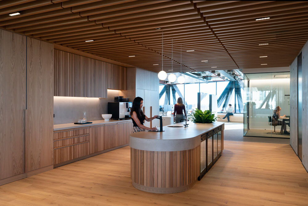 Kitchen area with women using sink