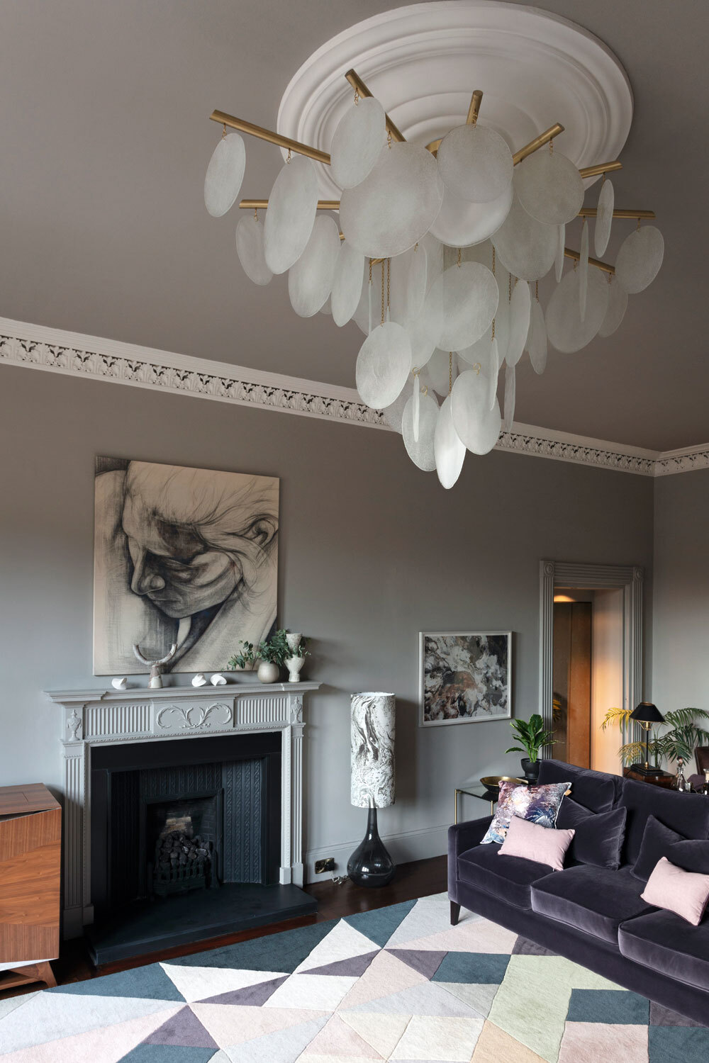 Living area with large light fitting