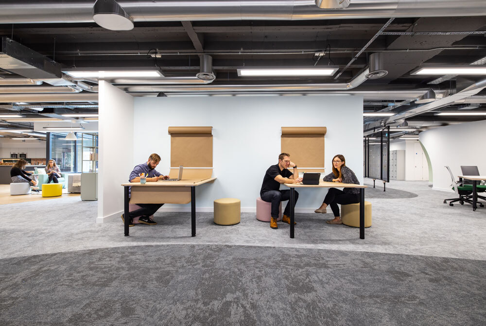 Meeting tables with people talking