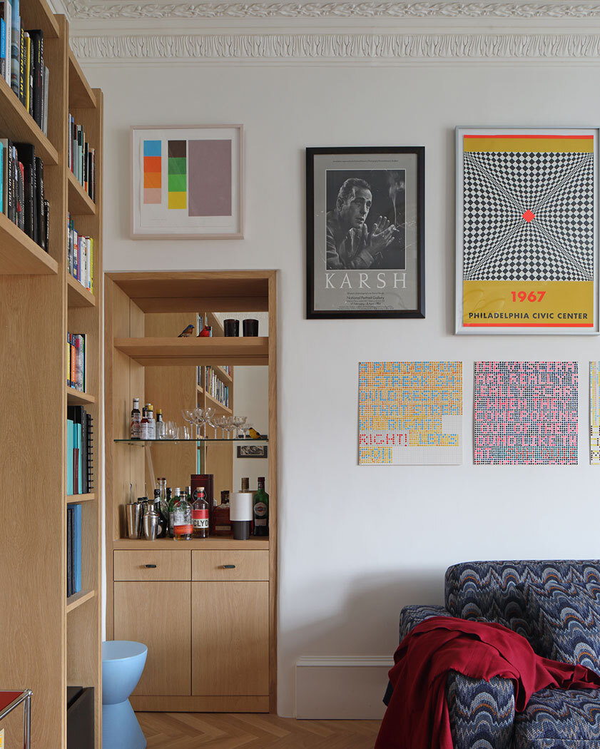 Living room with posters on wall