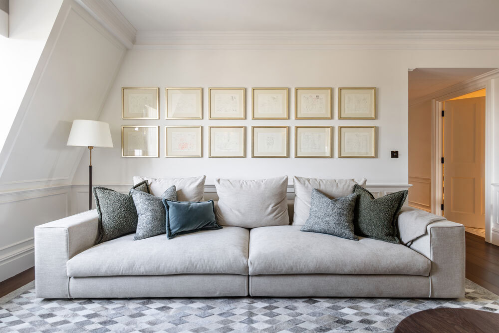 Sofa in room with artwork