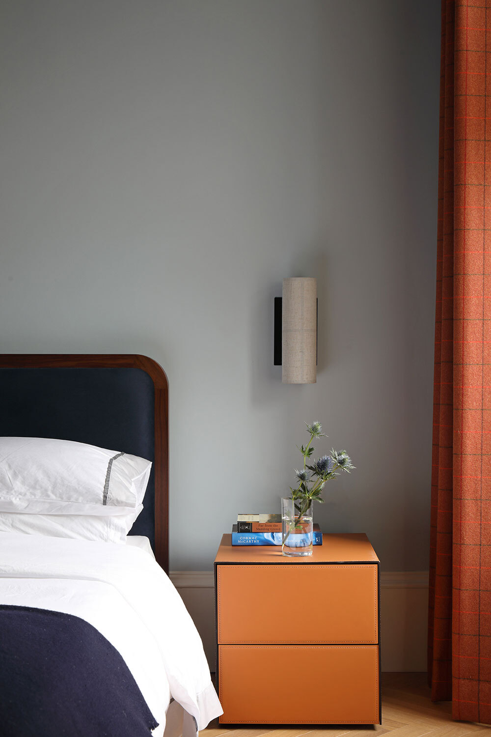 Bed with bedside table