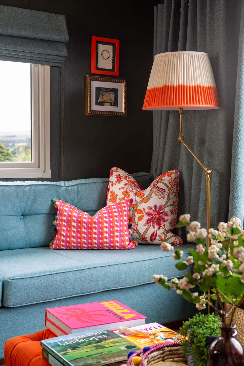 Sofa with cushions and lamp