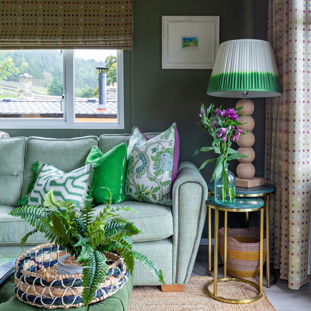 Sofa with cushions and lamp