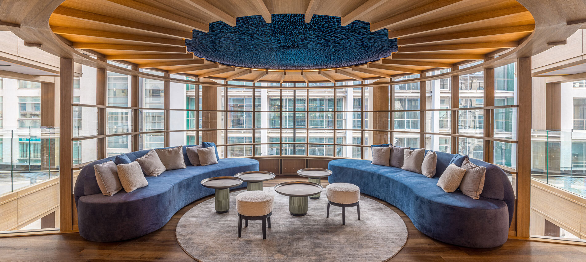 Curved sofas in curved space