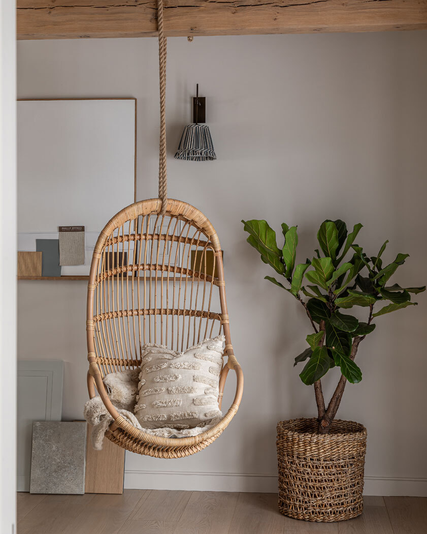 Hanging chair with plant