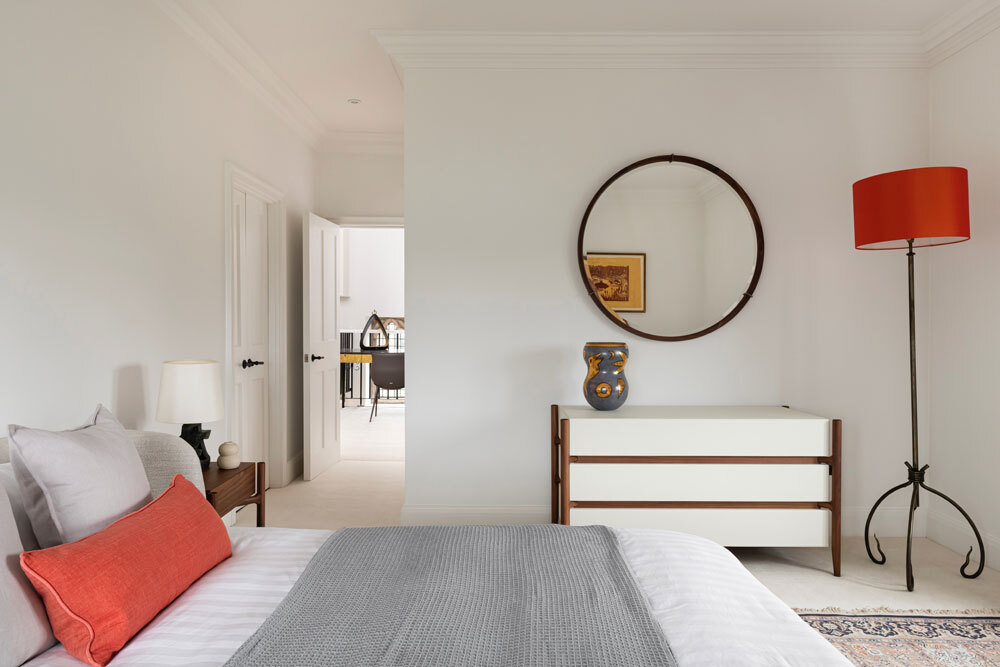 Bedroom with lamp in corner