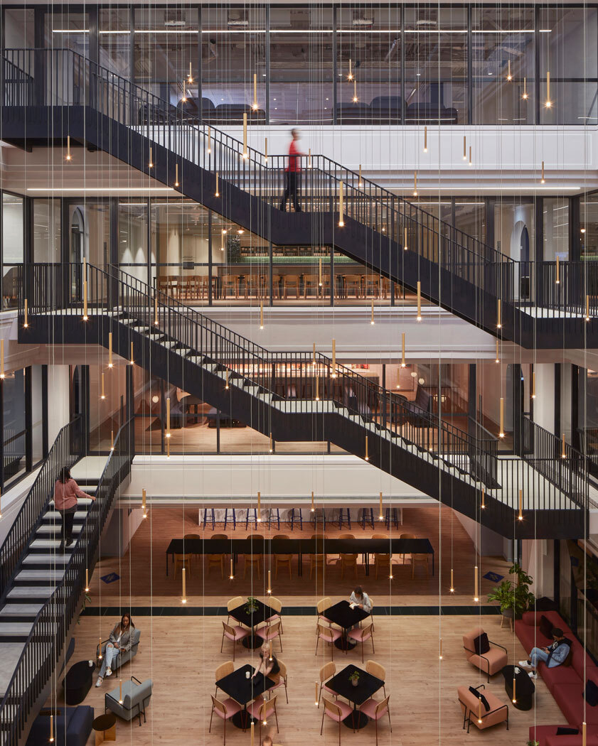 lots of stairs going across inside of a building