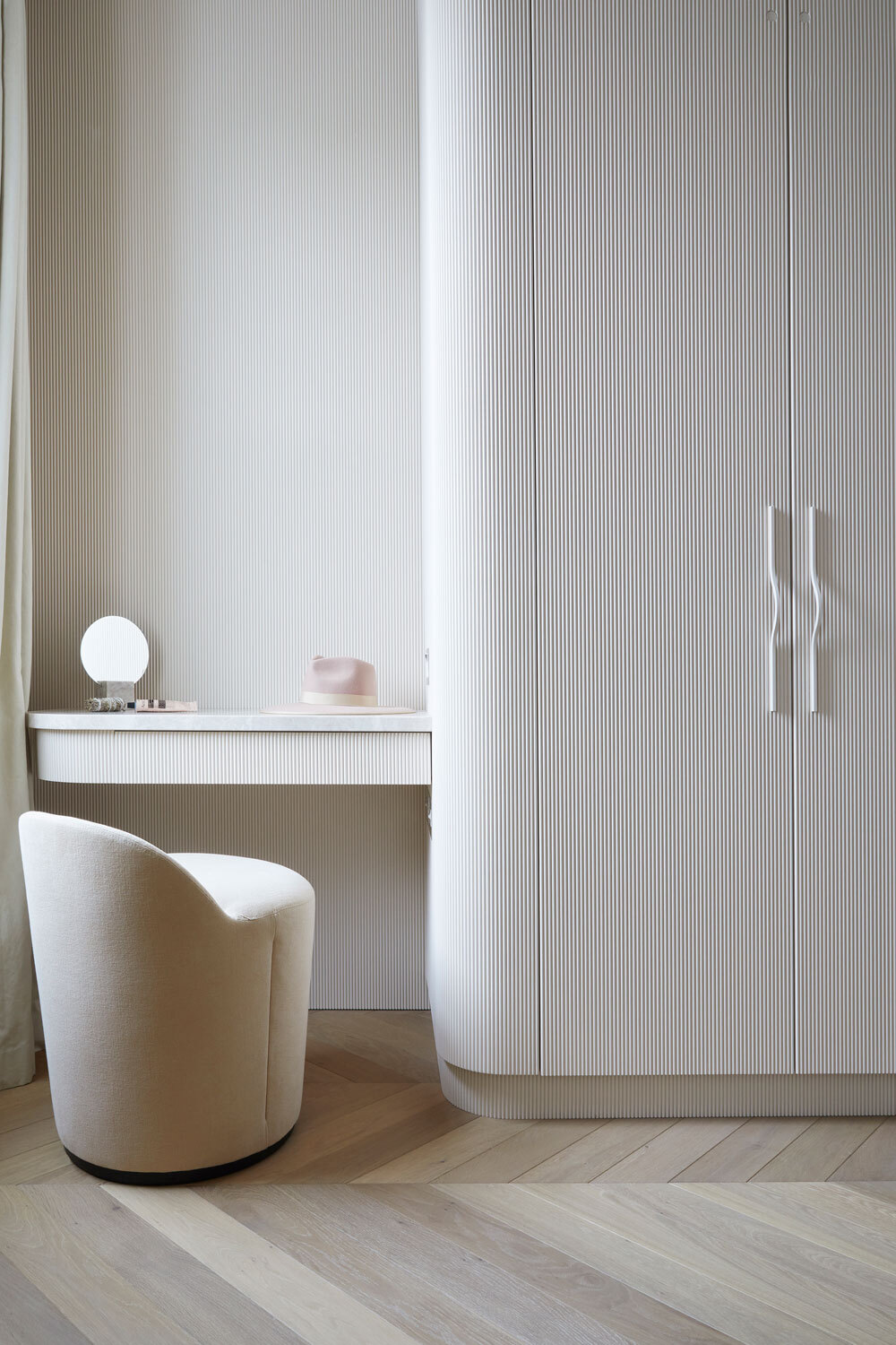 Dressing table next to wardrobe