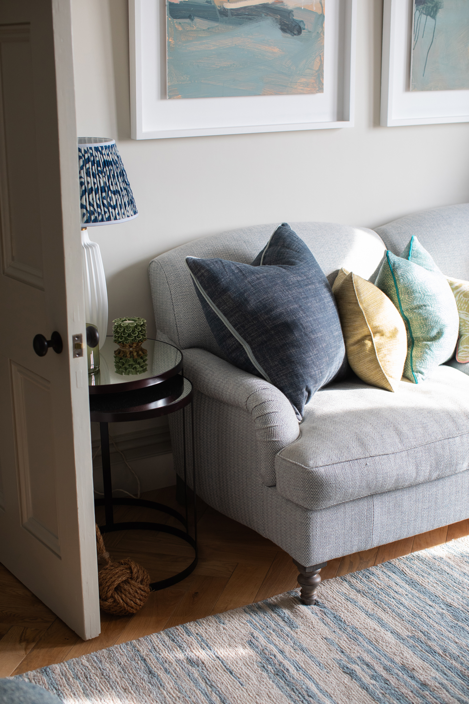 Comfortable sitting room within a Victorian townhouse, showing a layered interior architecture approach to period home refurbishment designed for relaxed family living.