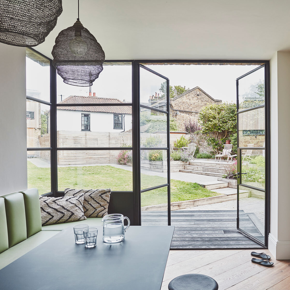 Dining room with glass doors leading to garden