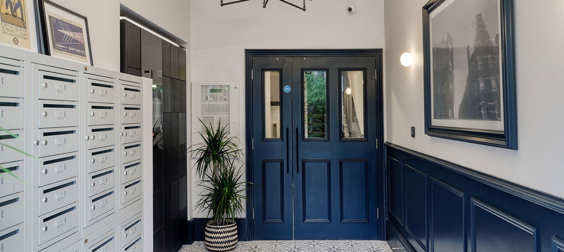 Hallway with storage and doorway