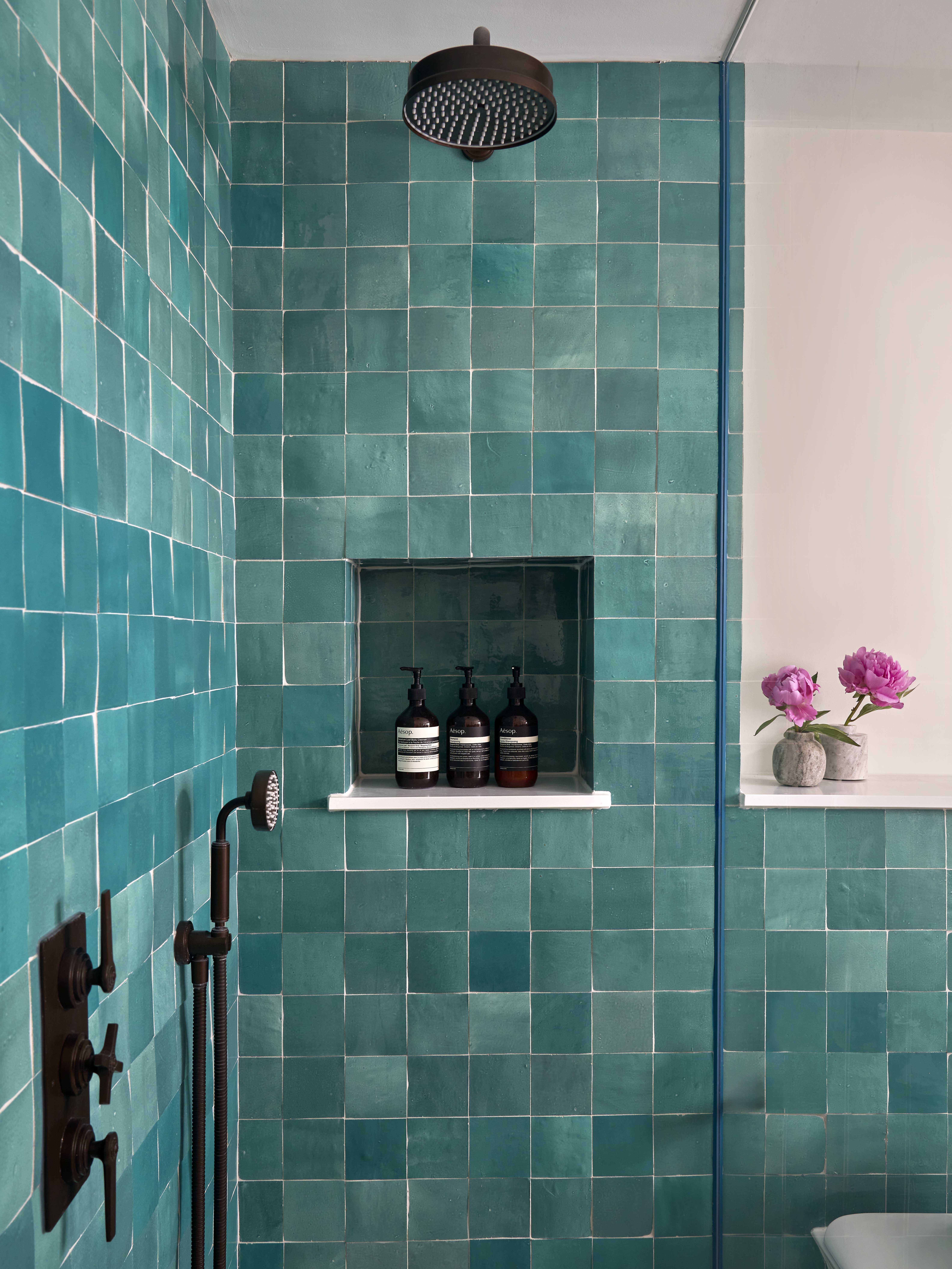 Handmade turquoise zellige tiles bring character and texture to this Family Bathroom.