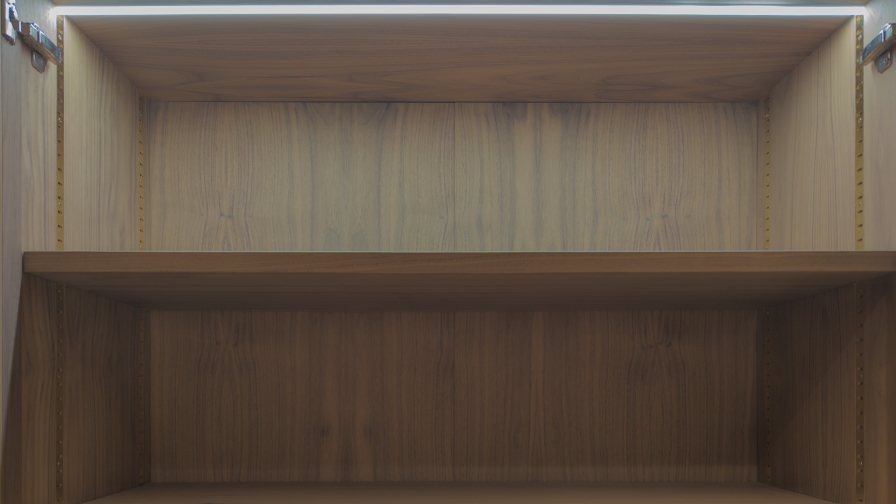 2 concealed AC access hatches as removable panels within the back of bespoke joinery