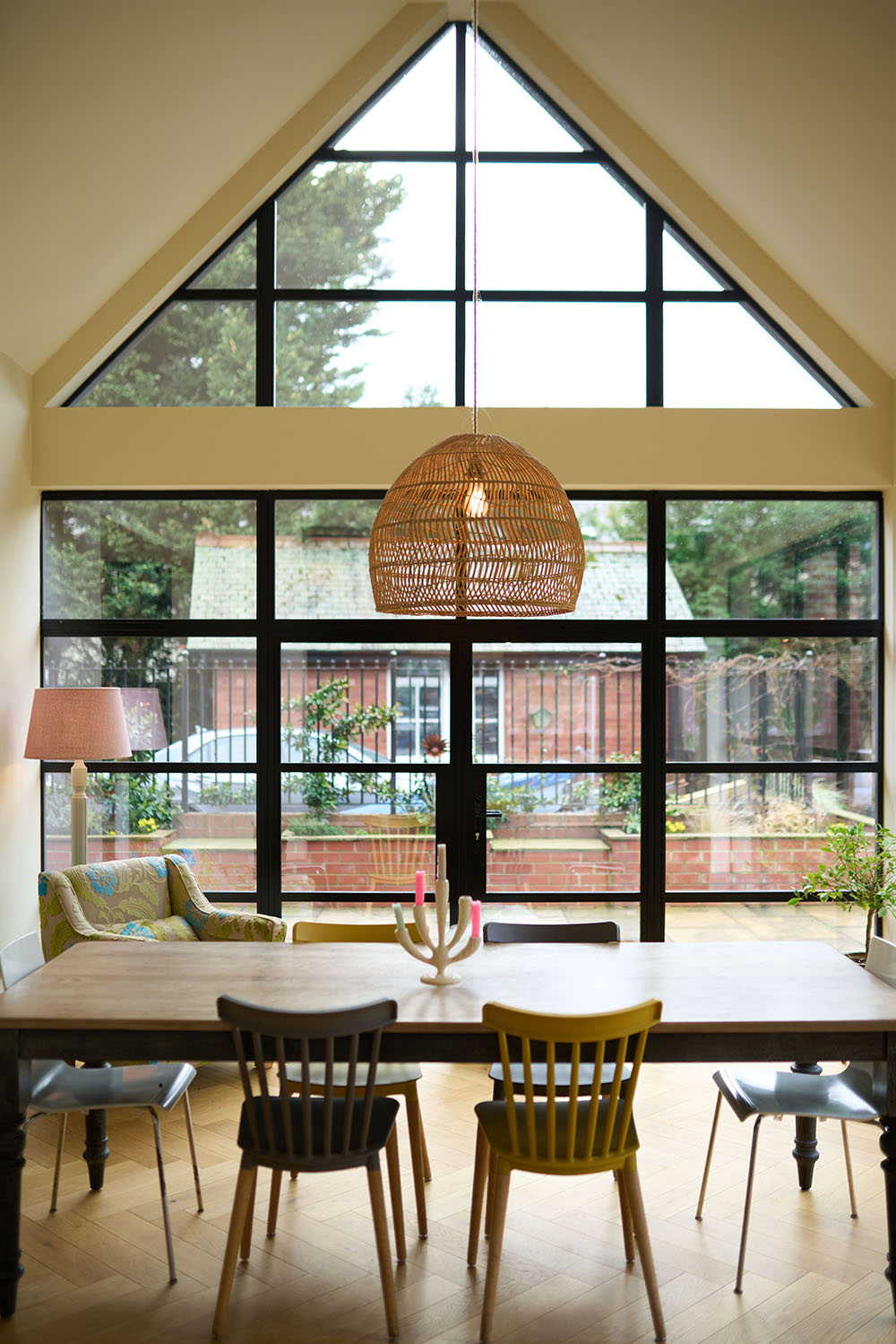 Dining table in front of glass gabel