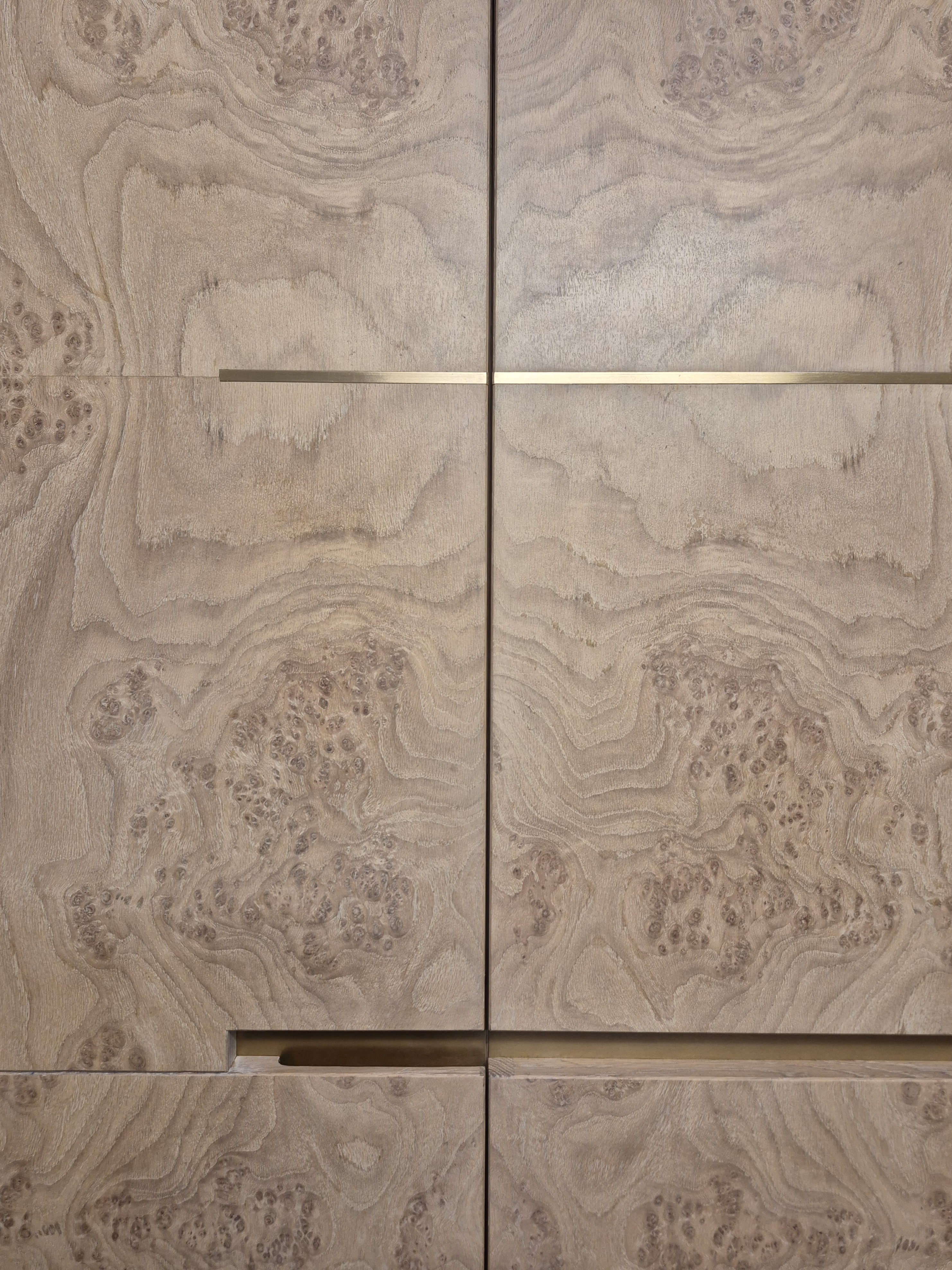 Recessed brass finger pull detail