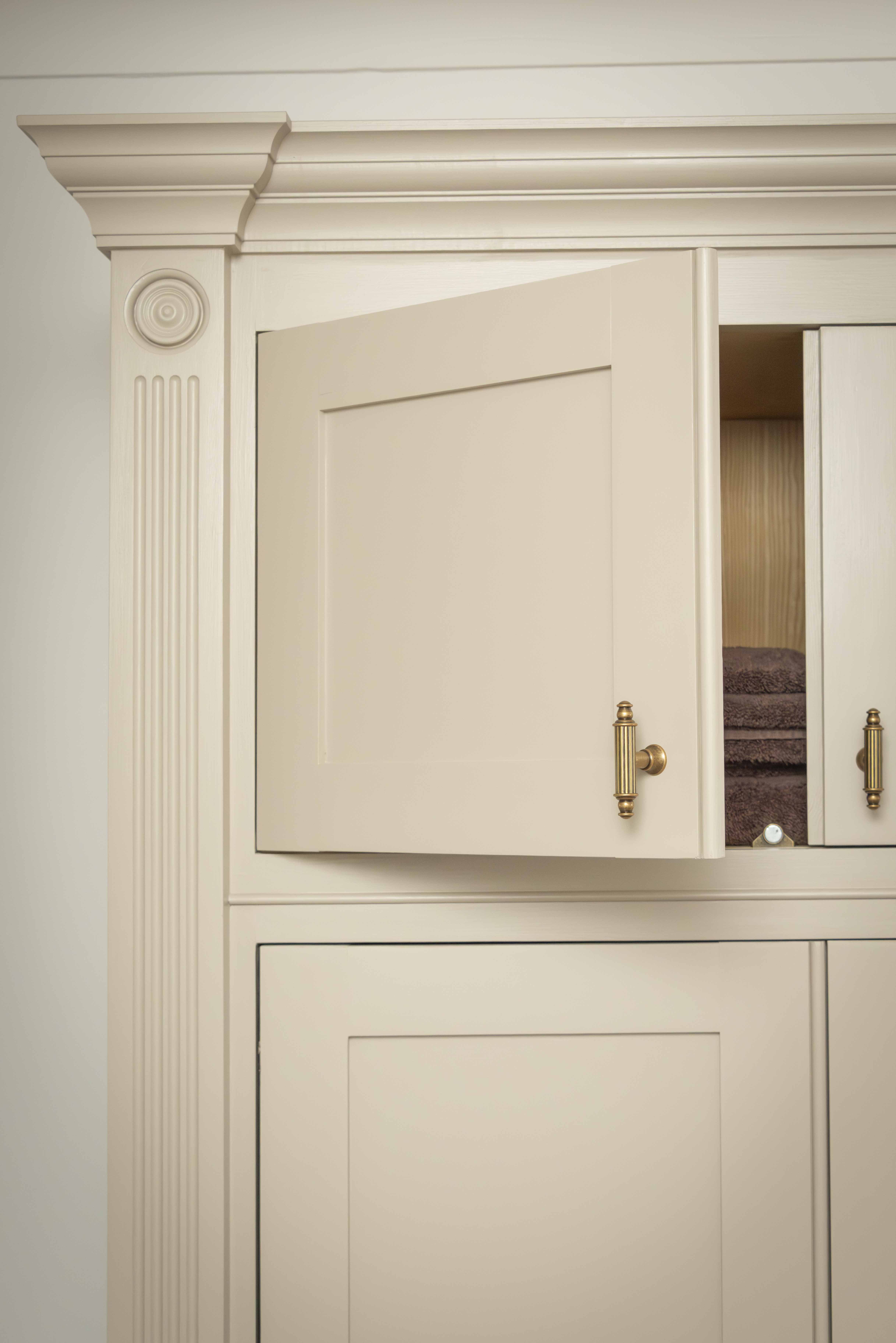 Cupboard detail showing pilaster and cornice