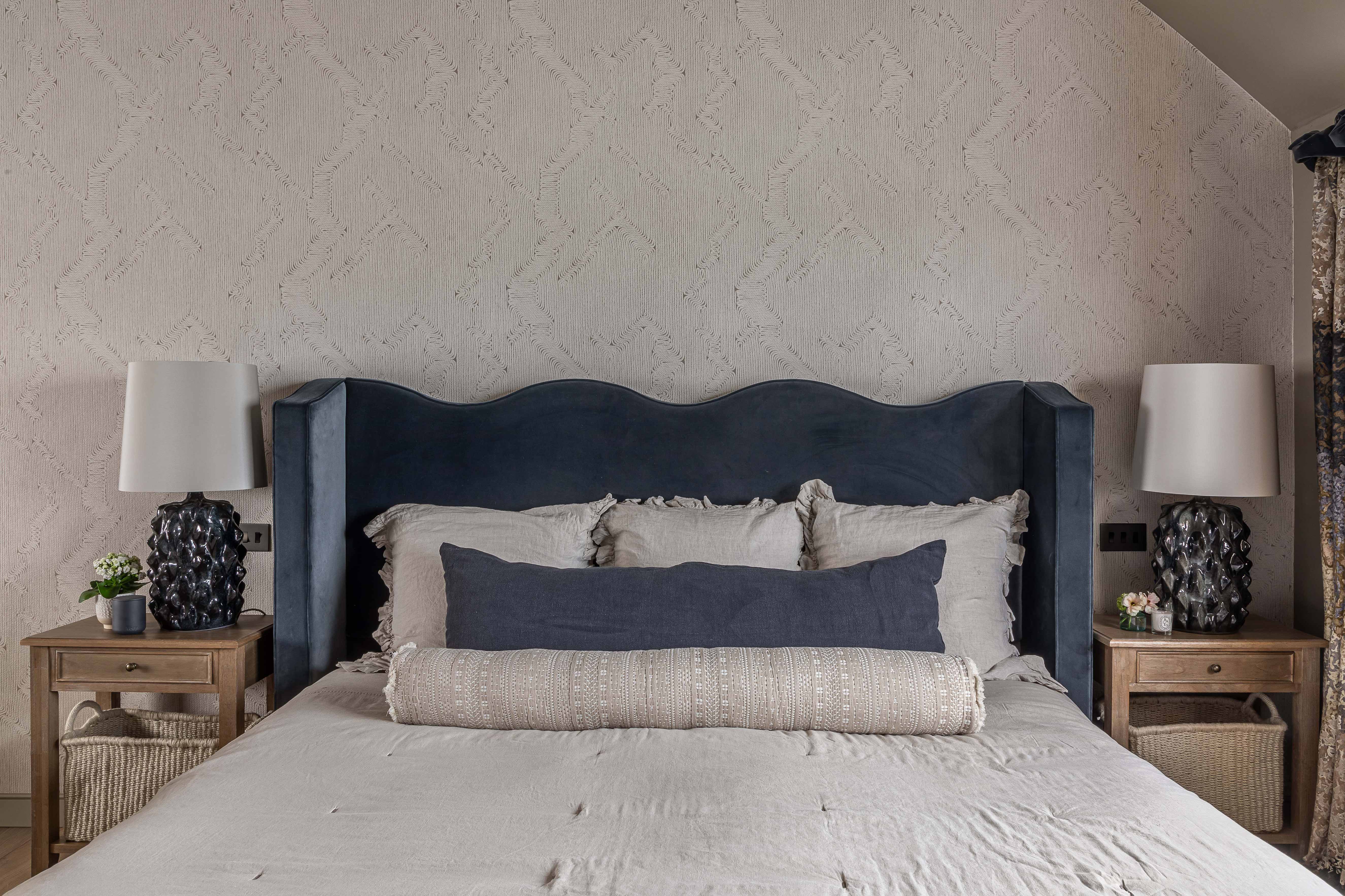 Upholstered Emperor bedframe with wave headboard in a muted blue velvet crafted by Origins Design for Chantal Elshout