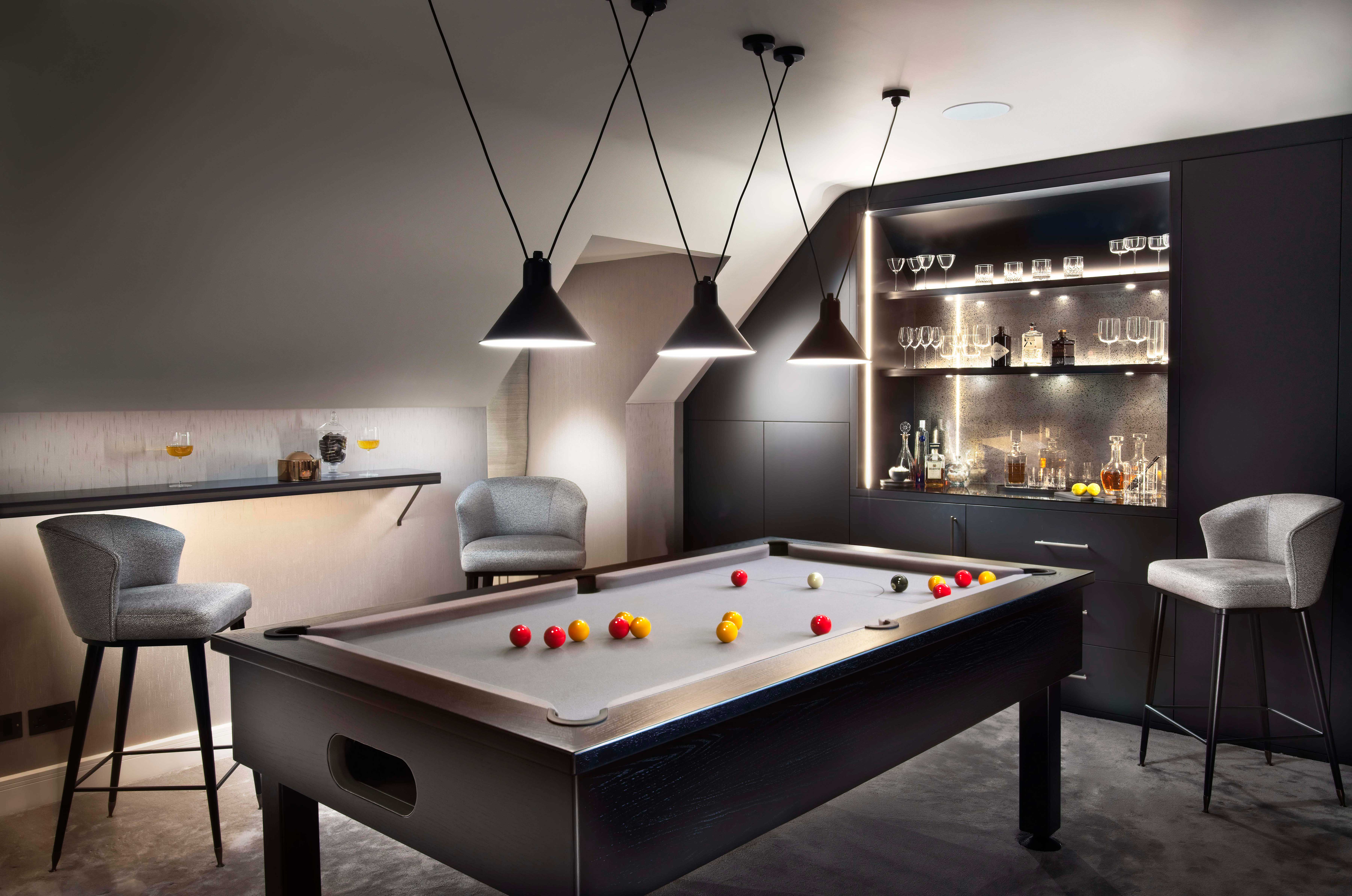Home bar and storage custom made by Origins Design. Every team at Origins Design were involved in the refurbishment of the pool table