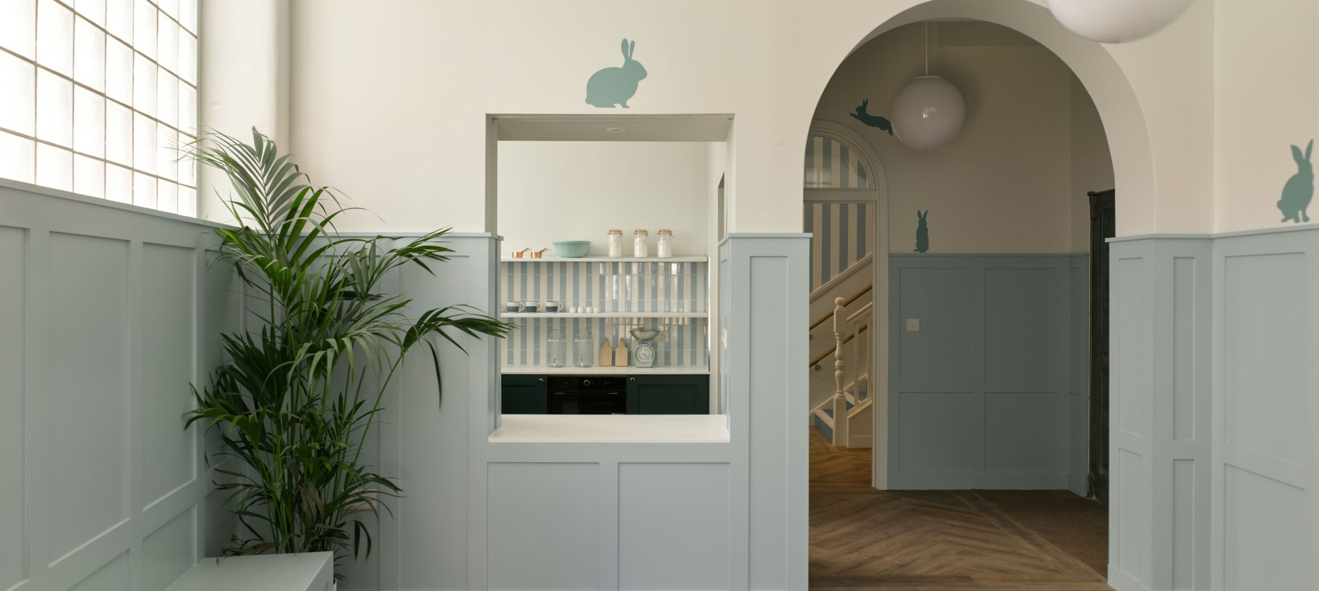 Archway and hatch through nursery