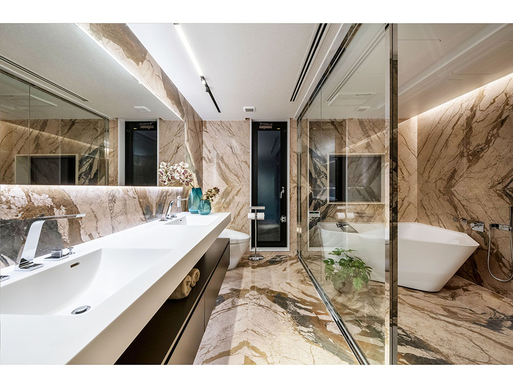 Bathroom with long mirrors