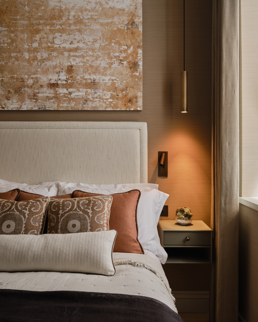 Bedroom with orange cushions