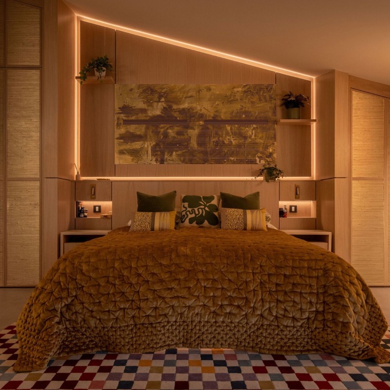 Light framed art work in bedroom