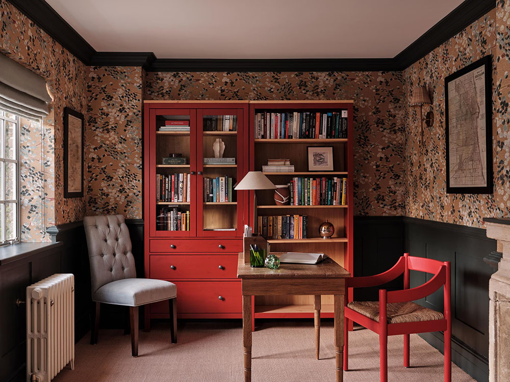 Red bookcases and wallpaper