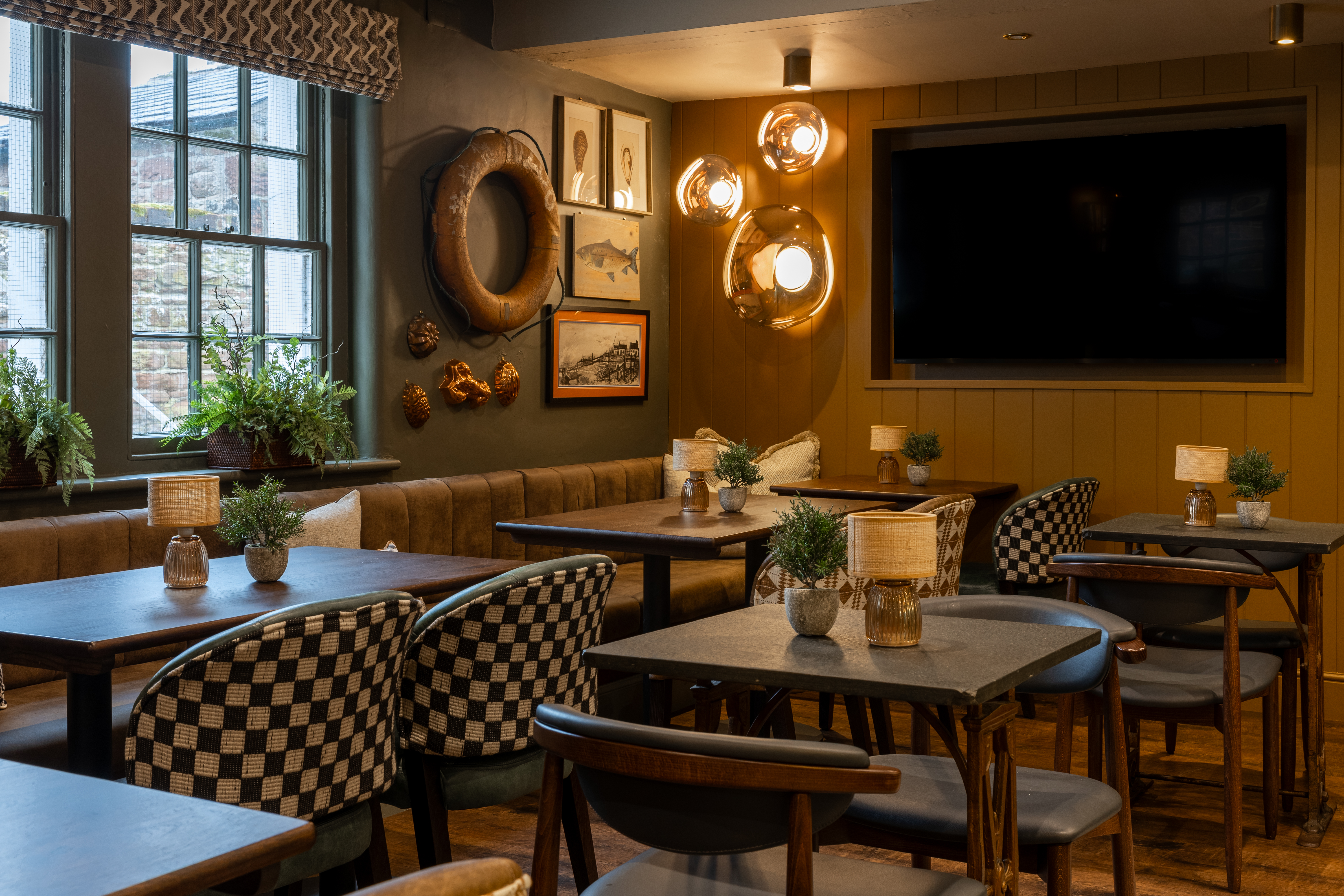 Dining Area with Tom Dixon Wall Light