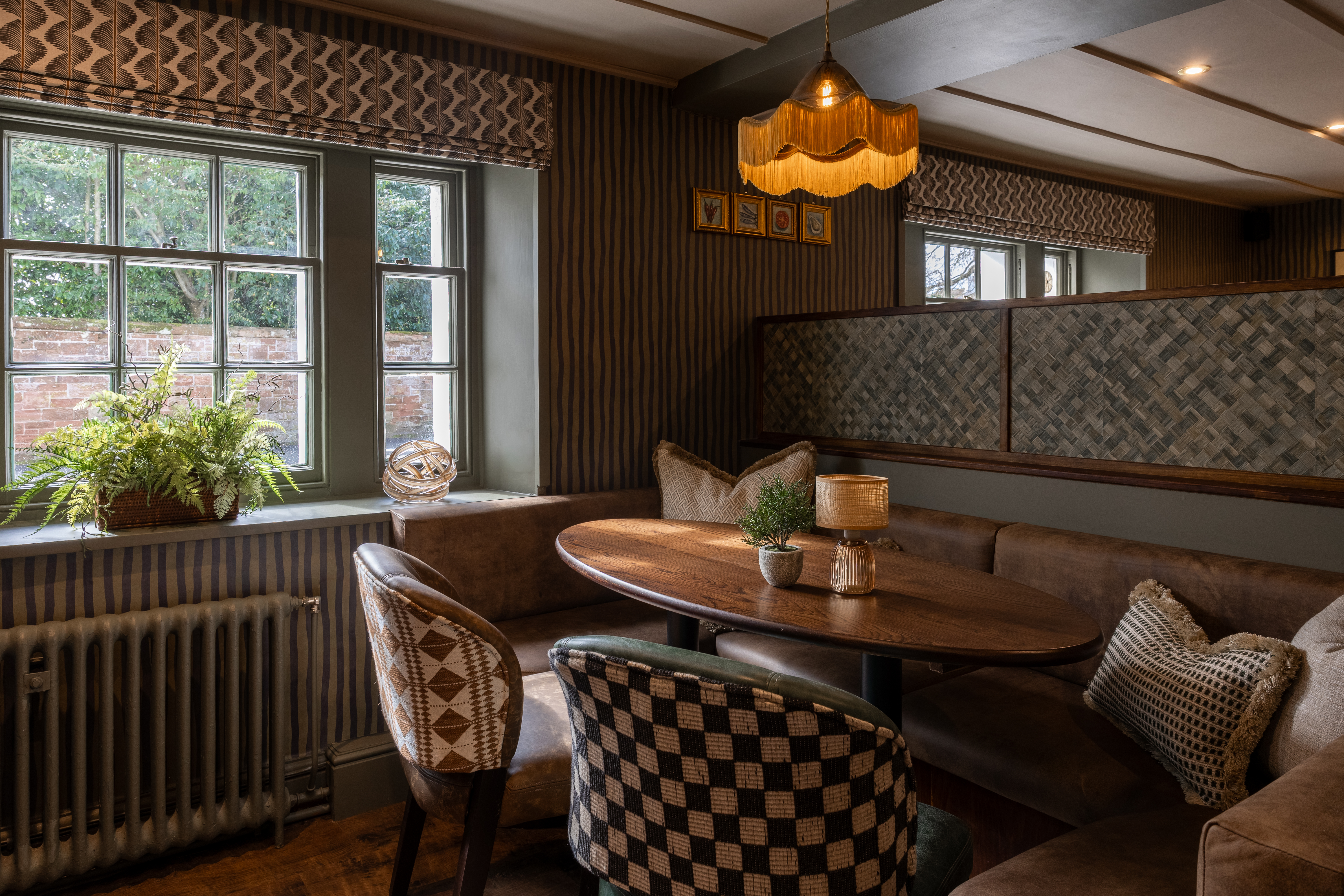 Window Seating with fringed pendant