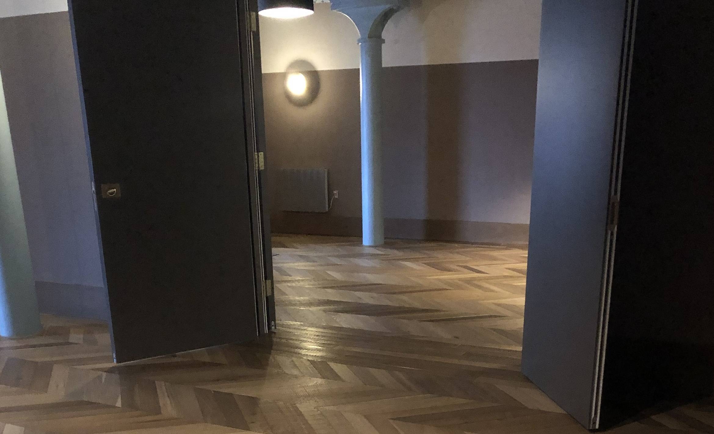 Deep Fumed band sawn chevron oak parquet flooring in the Apart Hotel Manchester